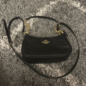 Teri Cross and handle black Coach bag